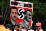 Picture: An anti-Bashar al Assad poster at a Free Syria rally in front of the White House courtesy Mr. T in DC/Flickr.