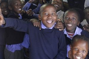 Picture: Children from Lukhanyo Primary School, Zwelihle Township, Hermanus courtesy Godot13/Wikimedia Commons.