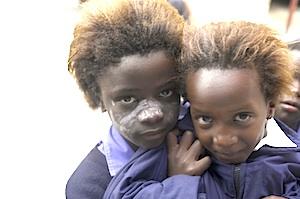 Picture: Children from Lukhanyo Primary School, Zwelihle Township, Hermanus courtesy Godot13/Wikimedia Commons.