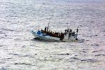 Picture: Refugees on a boat courtesy Wikipedia.