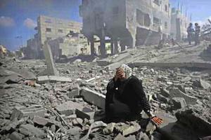 Picture: A woman is overcome and weeps at the destruction of her neighbourhood in Gaza courtesy Cintayati