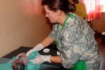 Picture: Army reserve nurse, Victoria Lynn Watson, delivers a baby in rural Uganda (courtesy United States Army Africa/flickr)