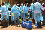 Picture: After receiving training, volunteers with the Red Cross Society of Guinea prepare to disinfect a hospital (afreecom/Idrissa Soumare).