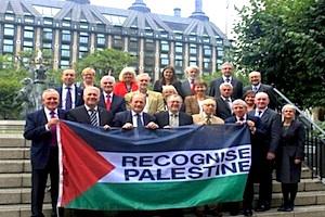 Picture: British MPs supporting the recognition of the State of Palestine pose with a Palestinian flag courtesy Press TV