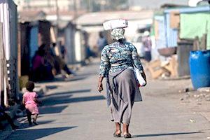 Picture: Woman walking in Langa township courtesy WBUR Boston