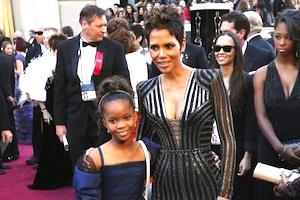 Picture: Quvenzhane Wallis and Halle Berry on the red carpet at the 2013 Oscar awards. Wallis played the lead role in a recent remake of the classic movie 